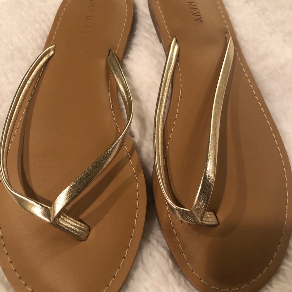 Size 7 gold flip flops